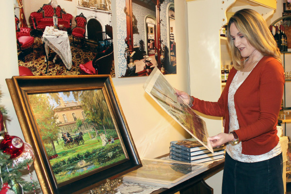 Guest browses photos in the Villa Louis store